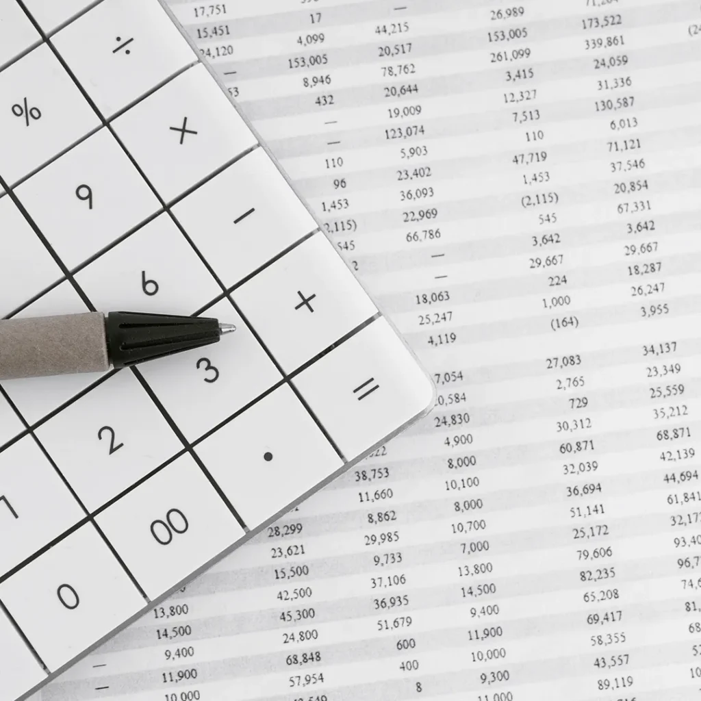 Close up shot of a calculator and account documents