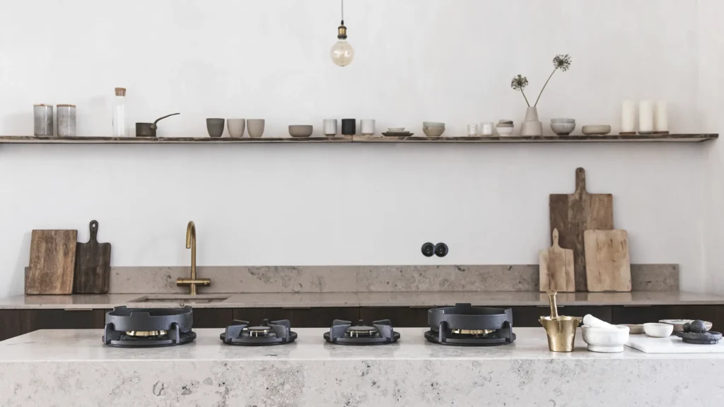 Lifestyle image for a light minimalist deisng kitchen featuring Pitt Cooking Danau 4 burner cooktop